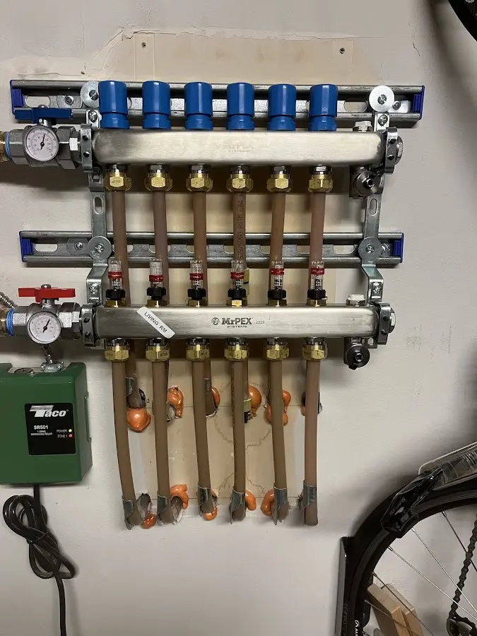 Plumber performing Water Heater Repair at a residential property in Trenton